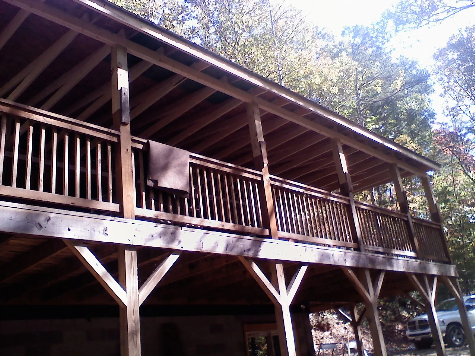 Timber framing under a new elevated porch and deck — Roof Leak Repair in Lolita by Roofing Brothers